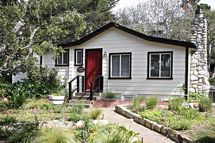 carmel lodging - cottage in the trees with red door