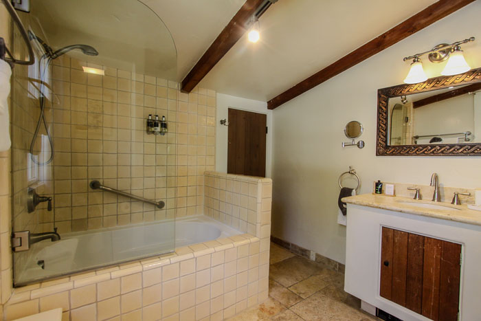 bathroom with tub and sink