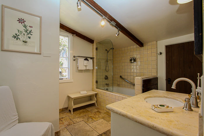 bathroom with tub and sink
