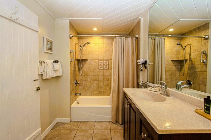 bathroom with shower and sink